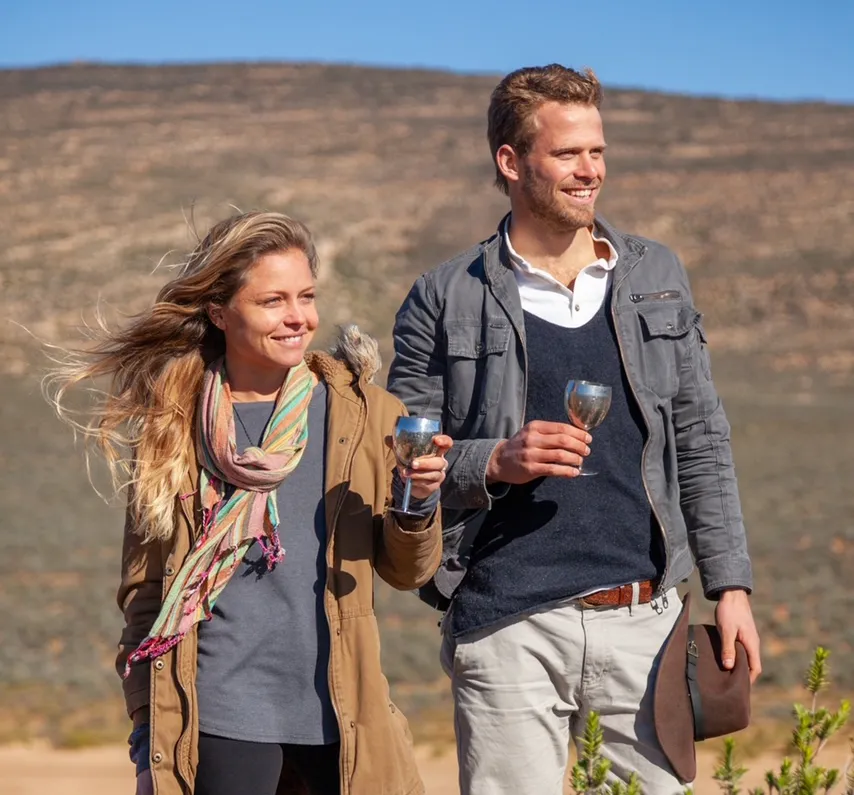 Guests wearing light cotton clothing and buildable layers as recommended in Aquila's Cape Town Safari Packing Guide.