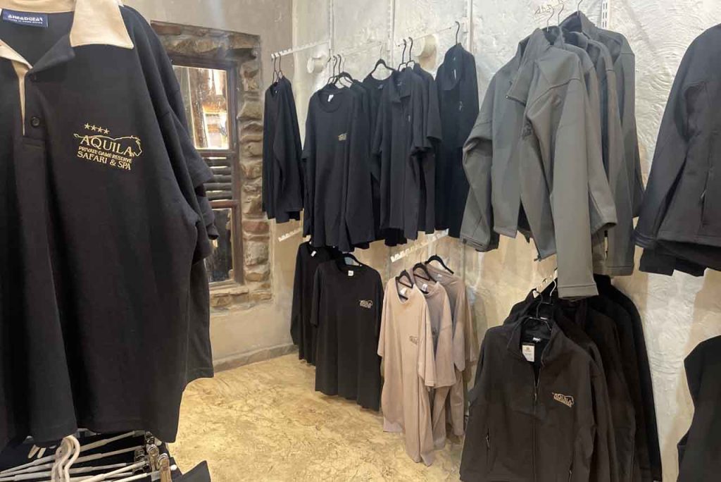 Aquila Branded shirts and clothing items shown in the reserve's curio shop